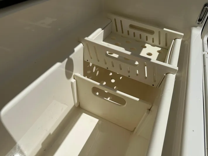 Dream Chaser Yacht Photos Pics Storage compartments on a 2021 Boston Whaler Realm 380 boat.