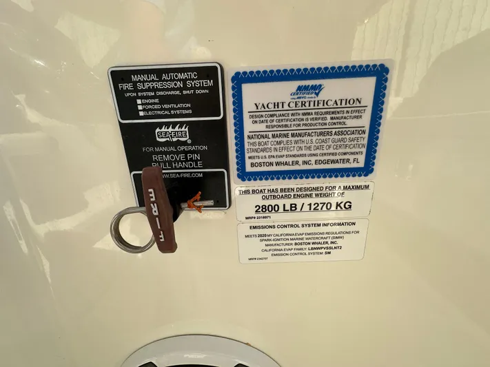 Dream Chaser Yacht Photos Pics 2021 Boston Whaler Realm 380 yacht certification and fire suppression system labels.