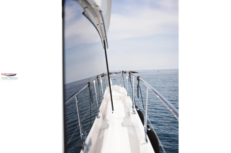 Sea Change Yacht Photos Pics Prestige 590 Fly yacht deck view, 2021 model, cruising on calm sea under clear sky.