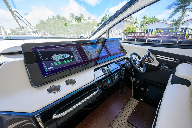 2024 Cruisers Yachts 50 Gls Outboard Yacht Photos Pics 2024 Cruisers Yachts GLS-OB helm with advanced navigation displays and luxurious interior.