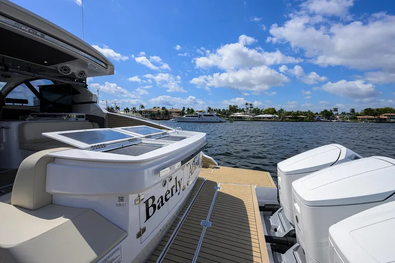 2024 Cruisers Yachts 50 Gls Outboard Yacht Photos Pics 2024 Cruisers Yachts GLS-OB on water, showcasing luxury design and powerful engines.