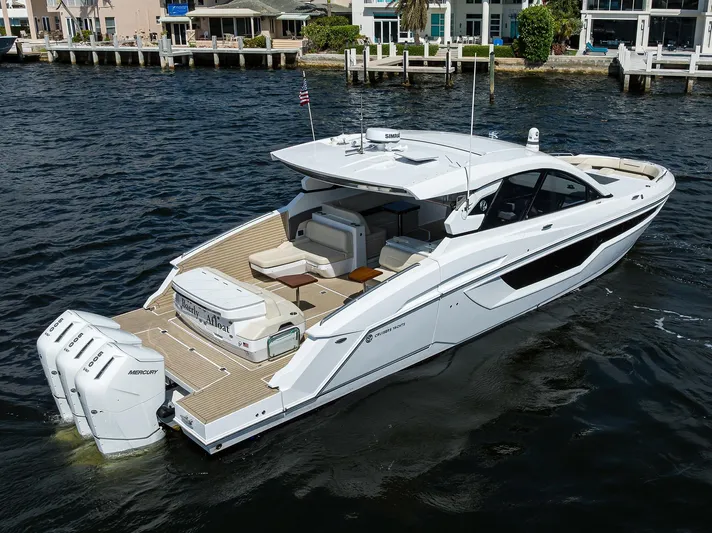 2024 Cruisers Yachts 50 Gls Outboard Yacht Photos Pics 2024 Cruisers Yachts GLS-OB luxury boat on water, featuring sleek design and powerful outboard engines.