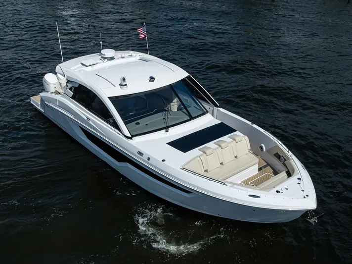 2024 Cruisers Yachts 50 Gls Outboard Yacht Photos Pics 2024 Cruisers Yachts GLS-OB luxury boat cruising on open water.