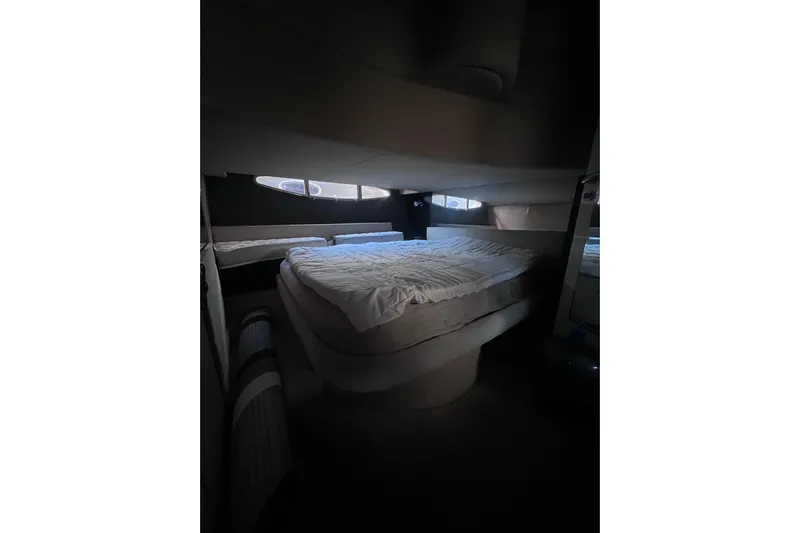  Yacht Photos Pics Luxurious bedroom interior of 2006 Azimut Atlantis 55 yacht with cozy bedding.