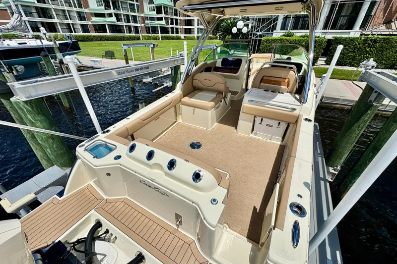  Yacht Photos Pics 2023 Chris-Craft Calypso 28 boat interior, featuring spacious seating and elegant design.