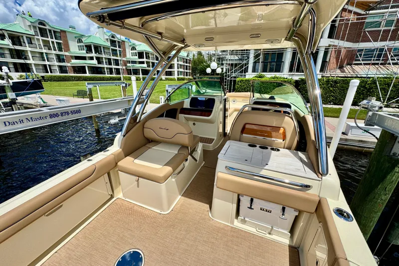  Yacht Photos Pics 2023 Chris-Craft Calypso 28 boat interior with luxurious seating and modern amenities.