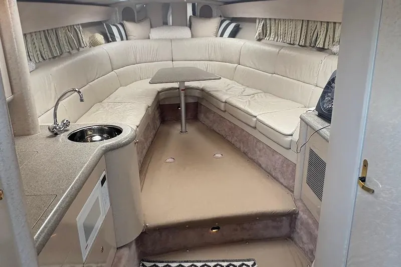  Yacht Photos Pics 2001 Formula 400ss cabin interior with kitchenette and seating area.