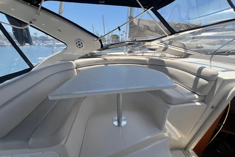 Bella Olivia Yacht Photos Pics Luxurious interior of 2000 Regal Commodore 4160 yacht with sleek seating and table.