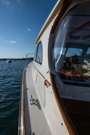 Eroica Yacht Photos Pics 2005 Hinckley Talaria 40 yacht on water, showcasing sleek design and luxurious interior.