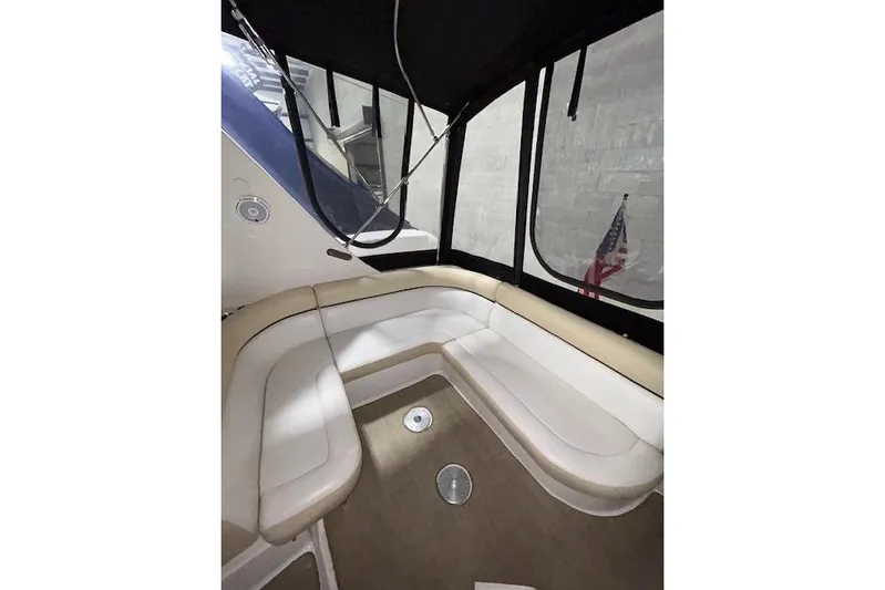 Gorgie Yacht Photos Pics 2008 Four Winns 338 Vista boat interior with beige seating and American flag.