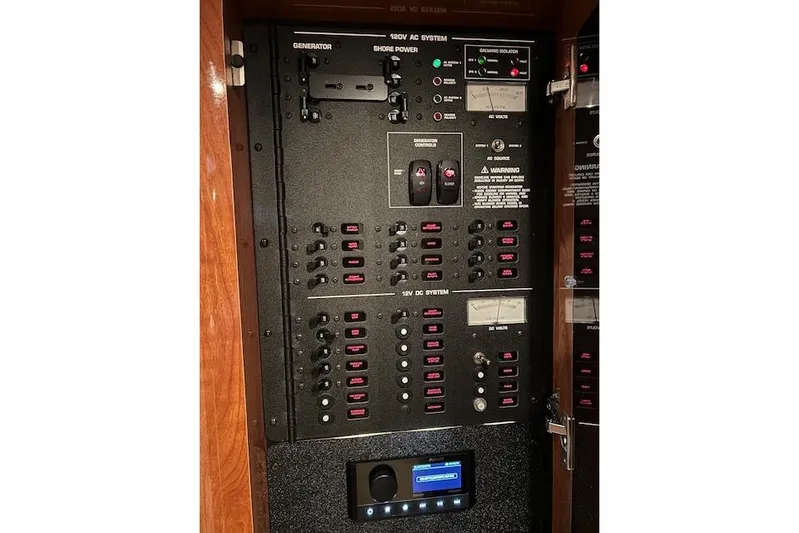 Gorgie Yacht Photos Pics Electrical control panel of 2008 Four Winns 338 Vista boat, featuring generator and shore power systems.