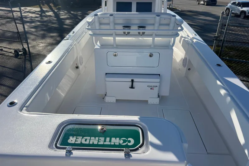  Yacht Photos Pics 2026 Contender 28 Tournament boat interior with storage and seating.