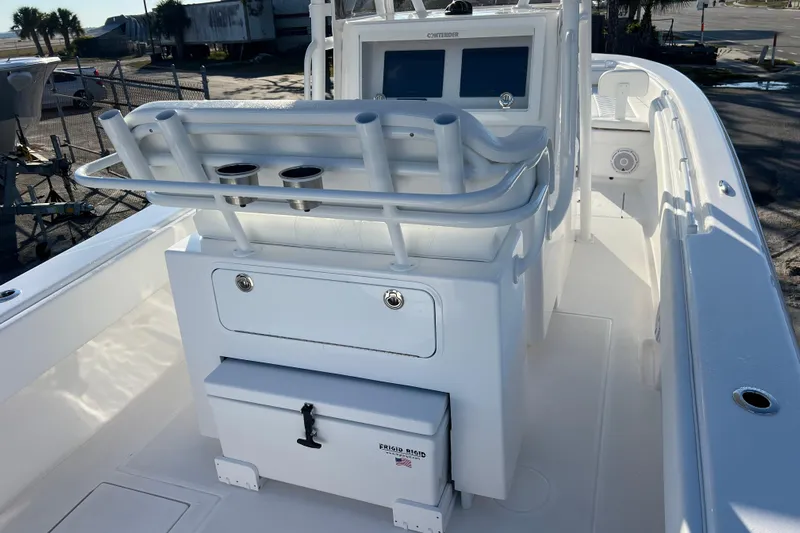  Yacht Photos Pics 2026 Contender 28 Tournament boat interior with seating and storage compartments.