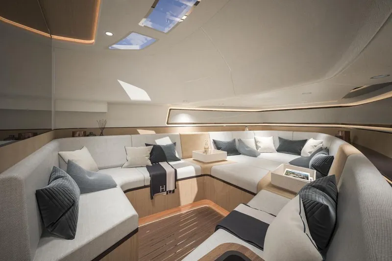  Yacht Photos Pics Luxurious interior of 2027 CNM Continental Tender yacht with elegant seating and modern design.