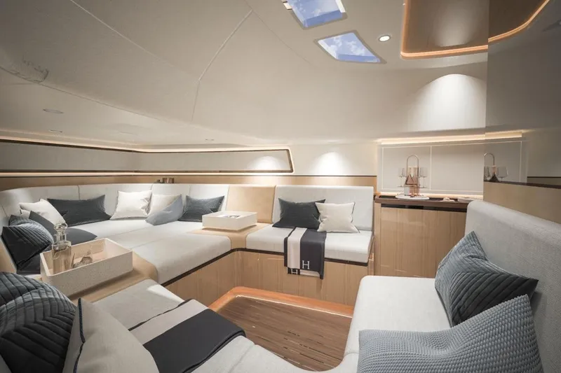  Yacht Photos Pics Luxurious interior of 2027 CNM Continental Tender yacht with elegant seating and modern design.