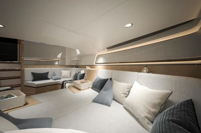  Yacht Photos Pics Luxurious interior of 2027 CNM Continental Tender yacht with elegant seating and cushions.
