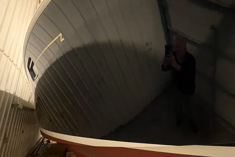 Liberty Yacht Photos Pics 2013 MJM 40z Downeast boat in storage, reflecting light.