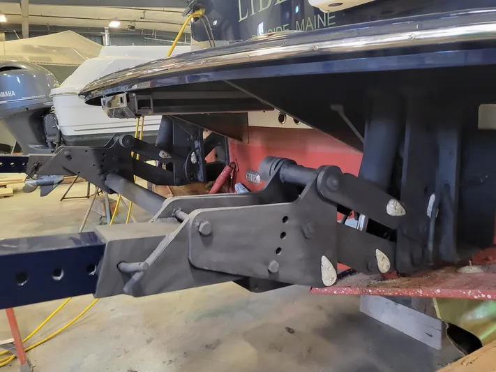 Liberty Yacht Photos Pics 2013 MJM 40z Downeast boat trailer hitch in a garage setting.