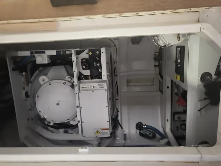 Liberty Yacht Photos Pics Engine compartment of 2013 MJM 40z Downeast boat, showcasing mechanical components.