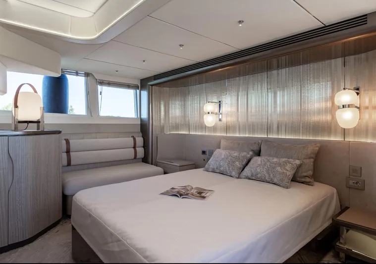  Yacht Photos Pics Luxurious bedroom interior of 2026 Galeon 620 FLY yacht with modern decor and ambient lighting.