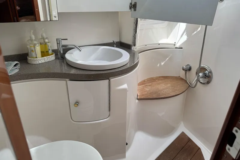  Yacht Photos Pics Luxurious bathroom in 2010 Regal 44 Sport Coupe yacht with modern fixtures.