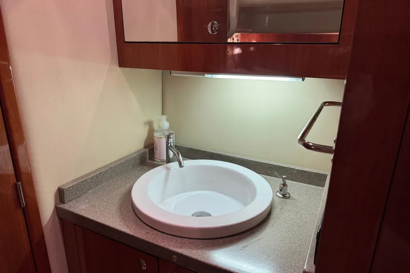  Yacht Photos Pics Luxurious bathroom sink in 2010 Regal 44 Sport Coupe yacht.