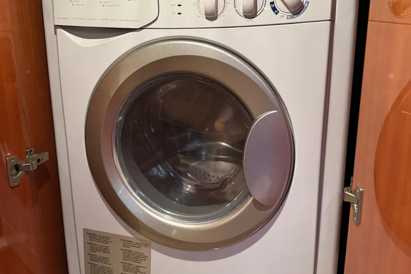  Yacht Photos Pics Front-loading washing machine inside a 2010 Regal 44 Sport Coupe yacht.