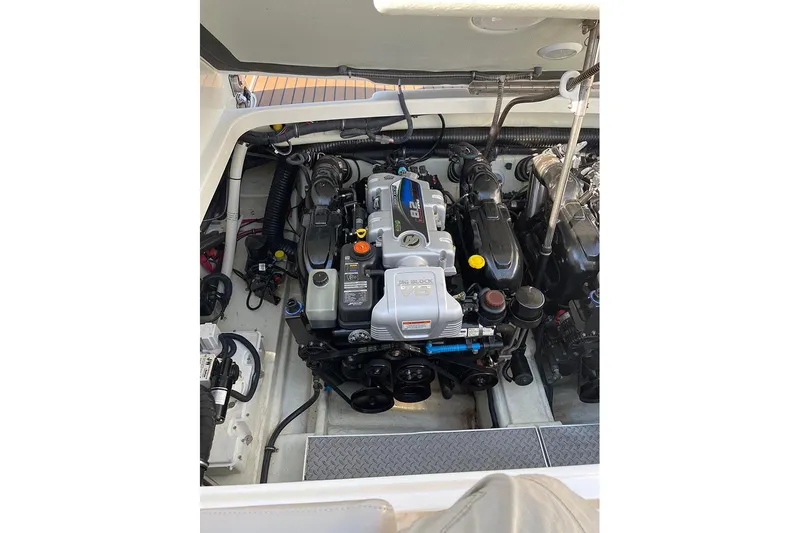 Gratitude Yacht Photos Pics Engine compartment of a 2015 Formula 350 Sun Sport boat, showcasing detailed mechanics.