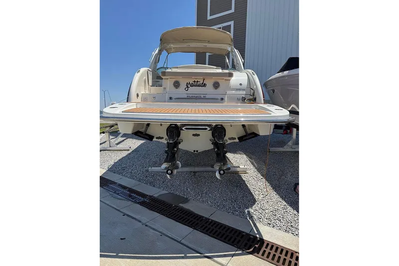 Gratitude Yacht Photos Pics 2015 Formula 350 Sun Sport boat on display, rear view with swim platform.