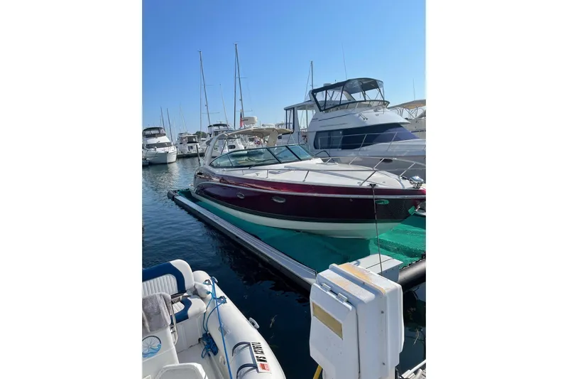 Gratitude Yacht Photos Pics 2015 Formula 350 Sun Sport boat docked at marina under clear blue sky.