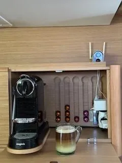  Yacht Photos Pics Coffee station on 2018 Dufour 512 Grand Large yacht with espresso machine and capsules.