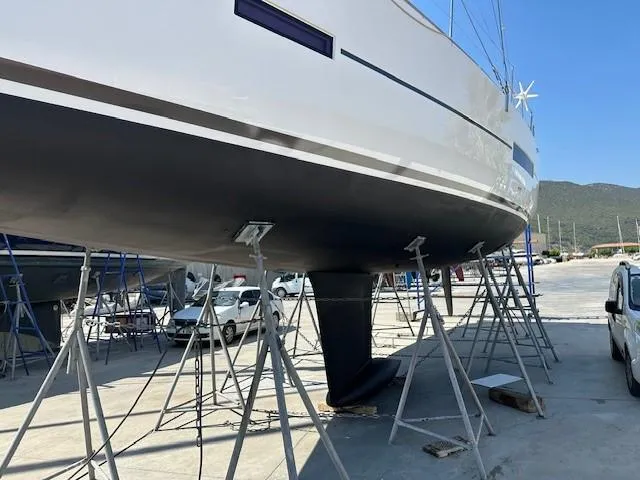  Yacht Photos Pics 2018 Dufour 512 Grand Large sailboat on stands in a boatyard.