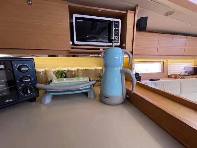  Yacht Photos Pics Modern kitchen in 2018 Dufour 512 Grand Large yacht with appliances and storage.