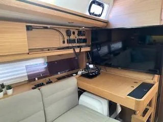  Yacht Photos Pics Interior of 2018 Dufour 512 Grand Large yacht with modern navigation equipment.