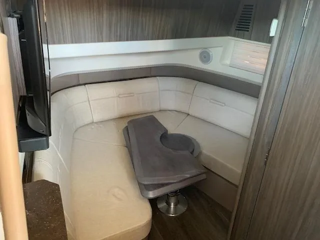  Yacht Photos Pics Interior of 2022 Sea Ray SLX 400 yacht with cozy seating area.