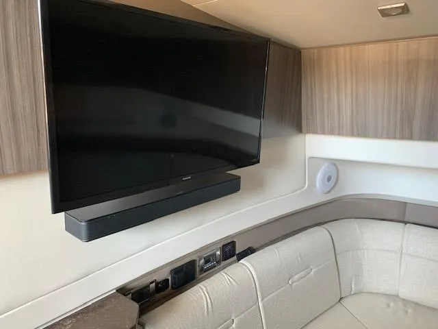  Yacht Photos Pics Interior of 2022 Sea Ray SLX 400 with mounted TV and soundbar.