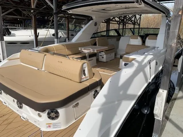  Yacht Photos Pics 2022 Sea Ray SLX 400 luxury boat with spacious seating and elegant design.