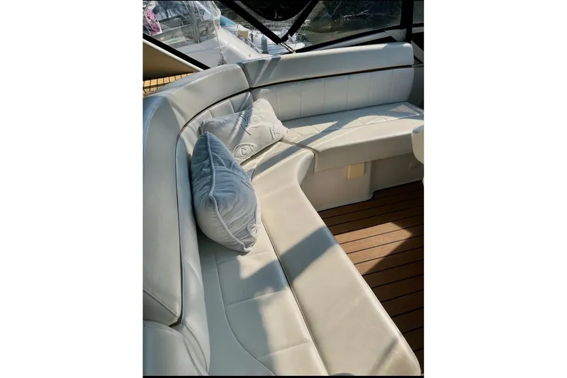 Our Turn Yacht Photos Pics Luxurious seating area on 2001 Carver 396 Aft Cabin Motor Yacht with plush cushions.