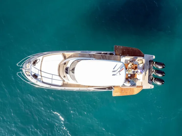  Yacht Photos Pics Aerial view of 2022 Sessa Marine Key Largo 40 yacht on clear blue water.