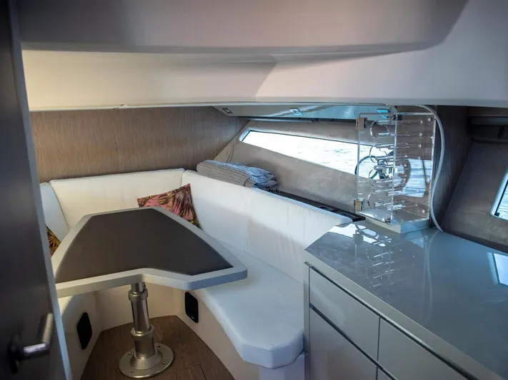  Yacht Photos Pics Interior of 2022 Sessa Marine Key Largo 40, featuring a modern dining area and sleek cabinetry.
