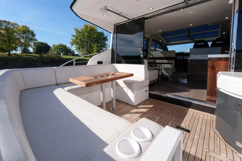  Yacht Photos Pics Luxurious 2023 Fairline Targa 50 yacht with elegant outdoor seating and modern interior design.