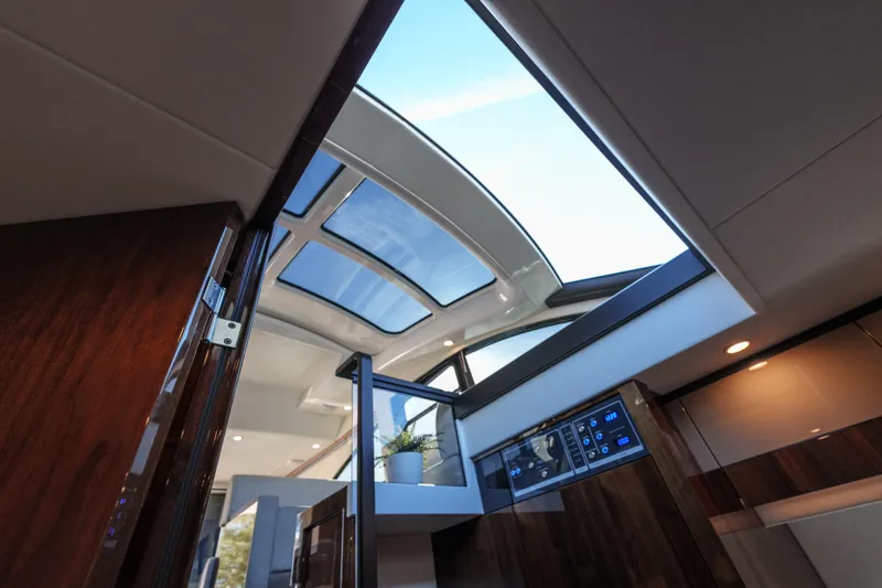  Yacht Photos Pics Interior view of 2023 Fairline Targa 50 yacht with skylight and modern design.