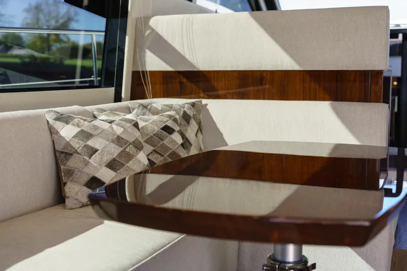  Yacht Photos Pics Luxurious interior of 2023 Fairline Targa 50 yacht with elegant seating and cushions.