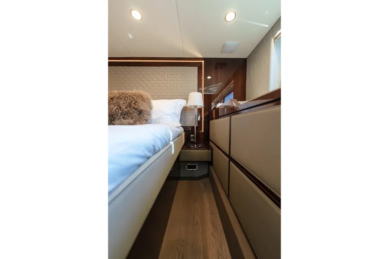  Yacht Photos Pics Luxurious interior of 2023 Fairline Targa 50 yacht bedroom with elegant furnishings.