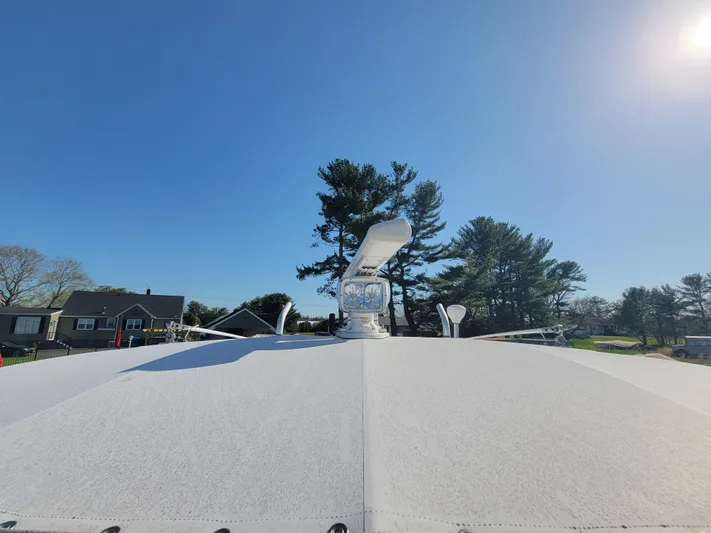  Yacht Photos Pics 1996 Venture 34 Center Console boat under clear blue sky.