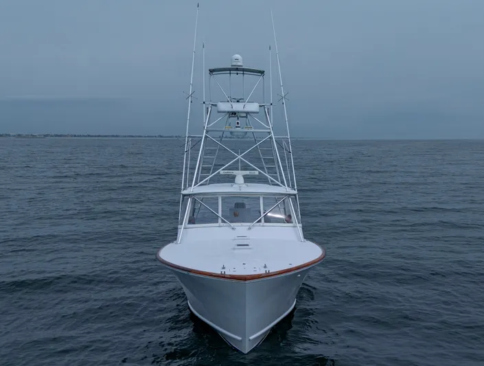  Yacht Photos Pics 2005 Gamefisherman 45 Express boat on open water, front view.