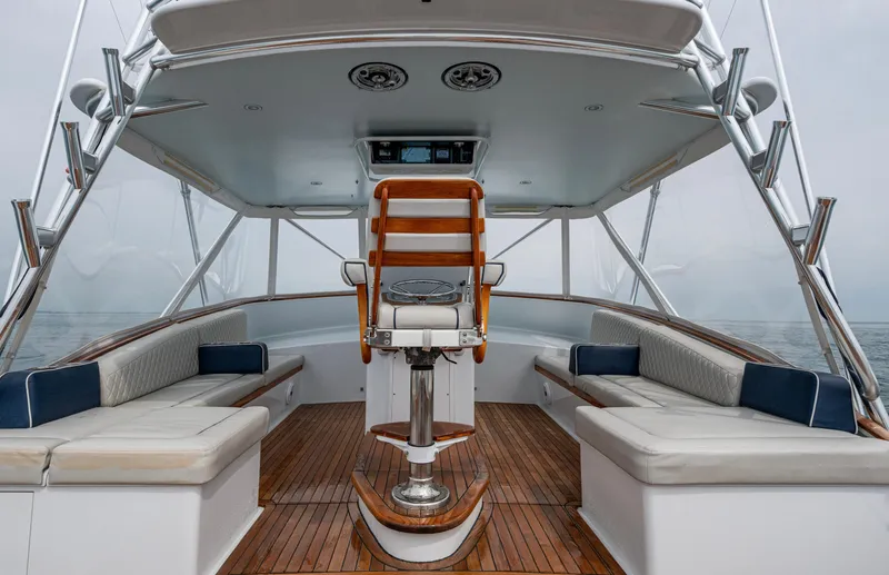  Yacht Photos Pics 2005 Gamefisherman 45 Express boat interior with seating and wooden flooring.