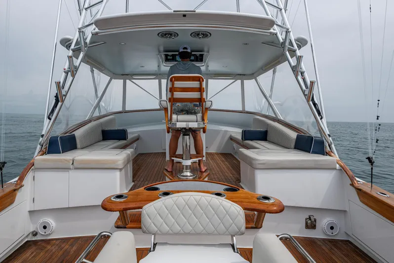  Yacht Photos Pics 2005 Gamefisherman 45 Express yacht interior with seating and helm station.