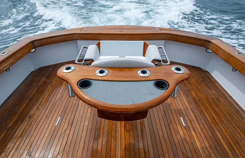  Yacht Photos Pics 2005 Gamefisherman 45 Express boat with wooden deck and fishing rod holders.