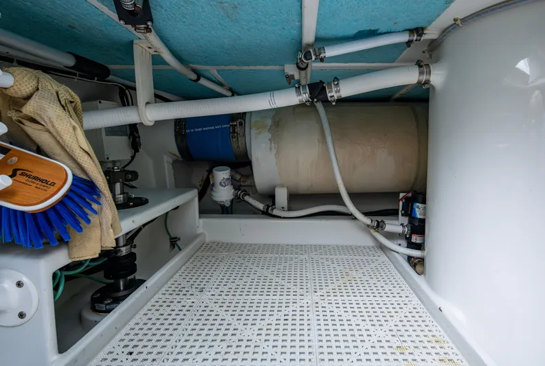  Yacht Photos Pics Engine room of 2005 Gamefisherman 45 Express with visible pipes and equipment.